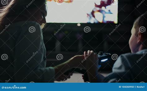 brandi love - stepmom plays with gamer sons joystick|Mom With Son In Front Of Tv Playing Video Stock Footage.